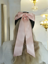 Load image into Gallery viewer, Pink Satin Back Bow Headband on Black Sinamay Halo Base with Tails