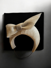 Load image into Gallery viewer, Beige Bow Fascinator 7 cms Tall Headband, With Silver Thread, Halo Shape, Races Headpiece
