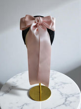 Load image into Gallery viewer, Pink Satin Back Bow Headband on Black Sinamay Halo Base with Tails