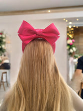 Load image into Gallery viewer, Bright Pink Satin Back Bow Headband Fascinator, on a Sinamay Halo Base,
