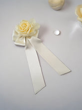 Load image into Gallery viewer, Ivory Bow Flower Fascinator on a sinamay base with hair clip,