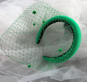 Green Satin Fascinator headband, with Dotty Blusher netting veiling,