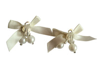 Load image into Gallery viewer, Clip-On Ivory Satin Bow Earrings with Diamante Sparkle and Pearl Beads – Elegant Bridal or Occasion Jewellery