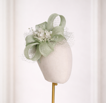 Load image into Gallery viewer, Light Sage Green Sinamay Fascinator Headpiece — Looped Bow with Diamante Flower Brooch