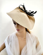 Load image into Gallery viewer, Beige Hatinator, Black Bow Fascinator, Feather Percher Hat, Saucer, Races , wedding headpiece, Mother of the Bride, Ascot hat